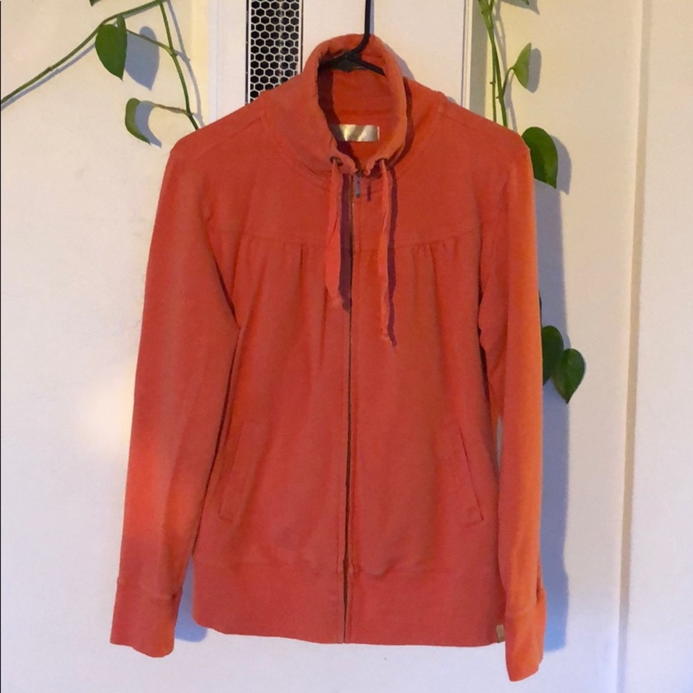 Tangerine zip up sweatshirt, no hood.